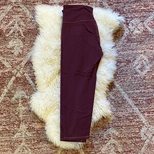 Athleta size S Deep Plum Chatarunga capri length leggings